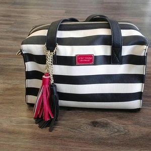 Betsey Johnson bag. Very roomy.